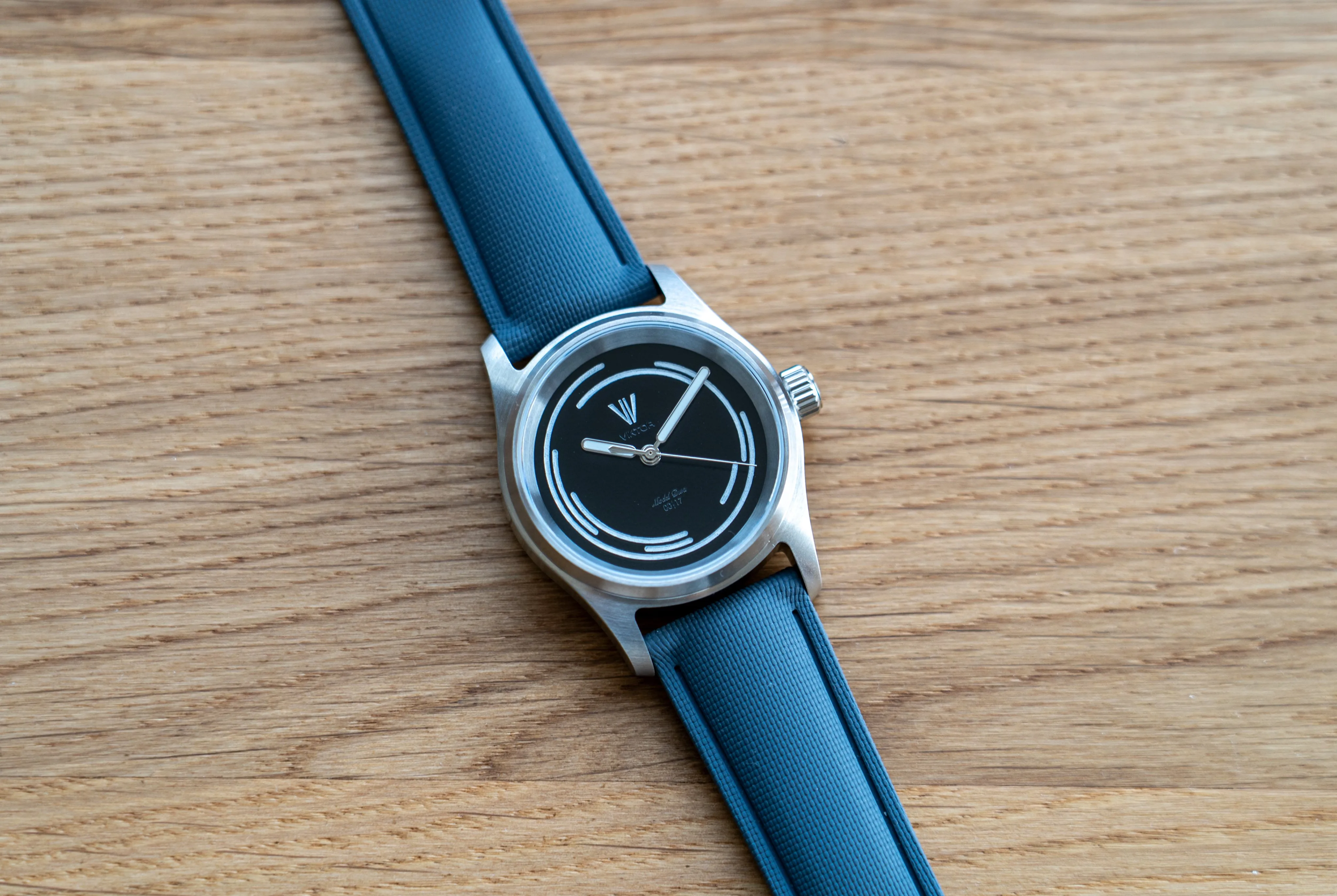 Model Dwa on a blue rubber strap