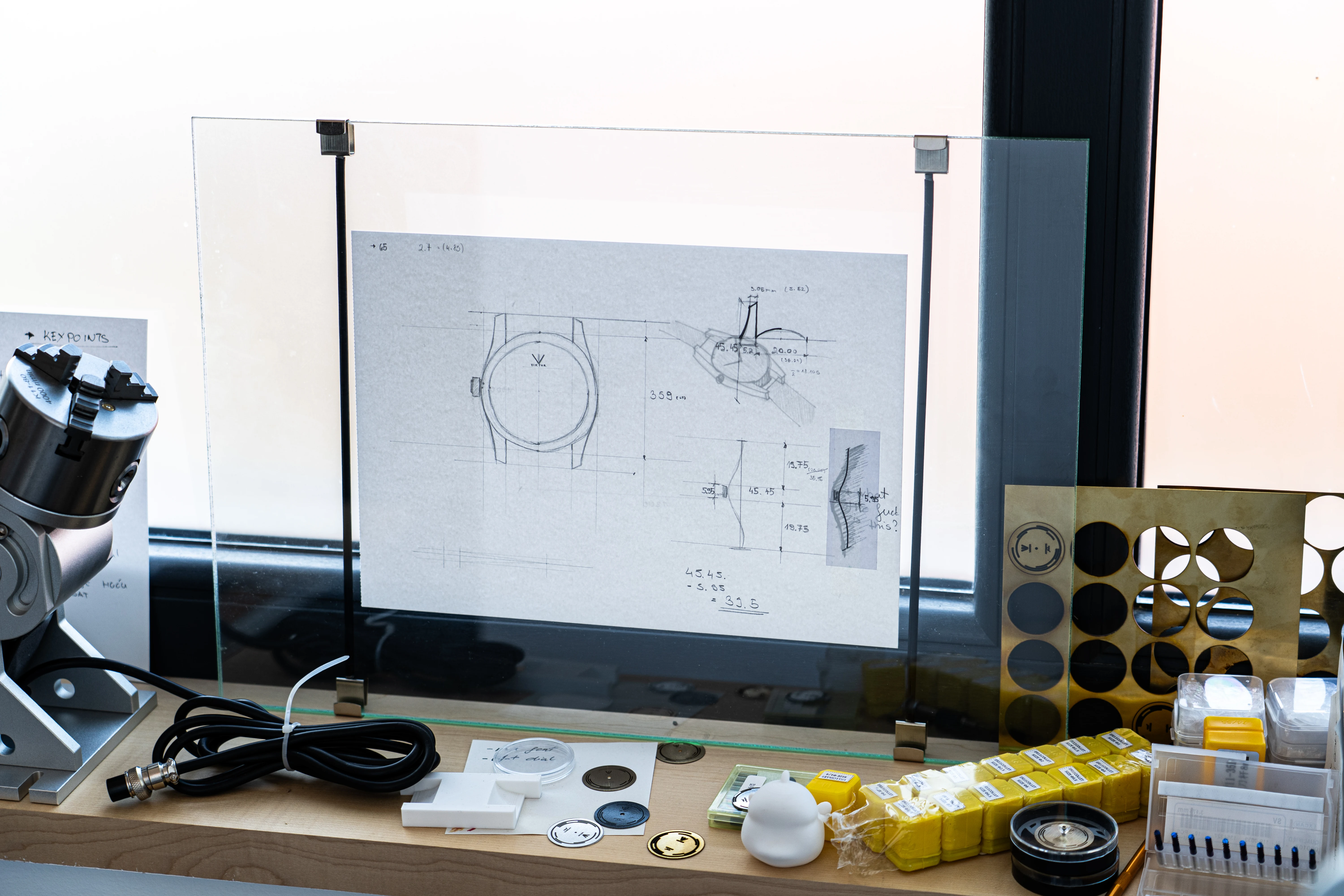 Framed original drawing included with the titanium watch