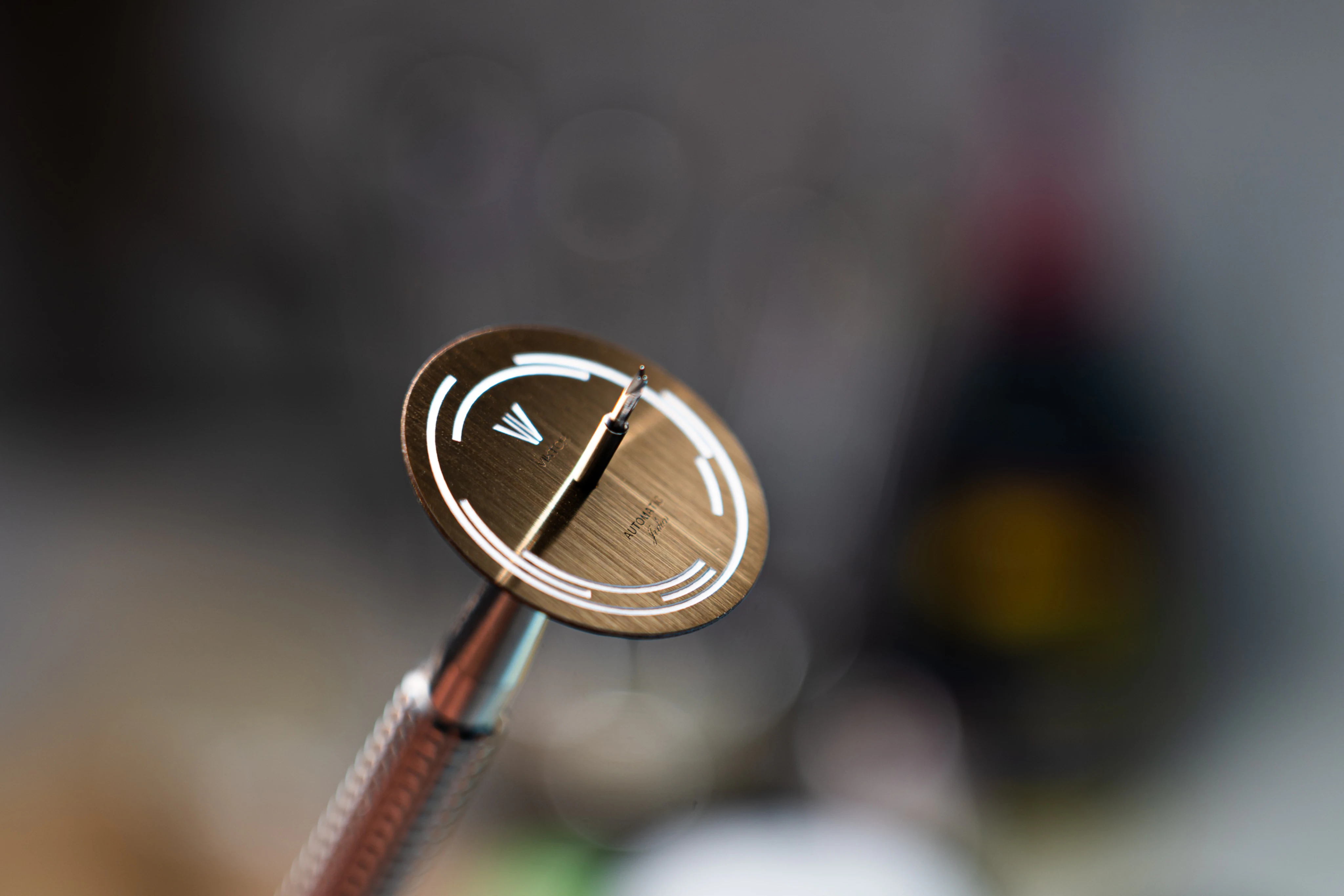 Model Jedan dial detail during assembly